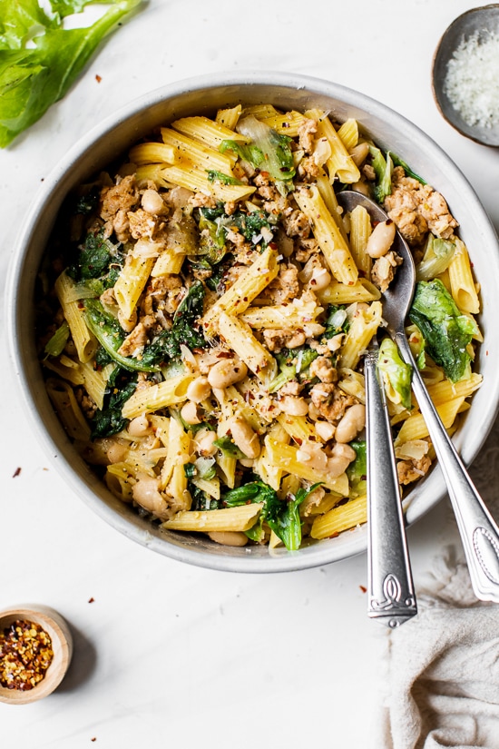 Pasta with Italian Chicken Sausage, Escarole and Beans is ridiculously good made with lots of garlic, lean Italian chicken sausage, and white cannellini beans.