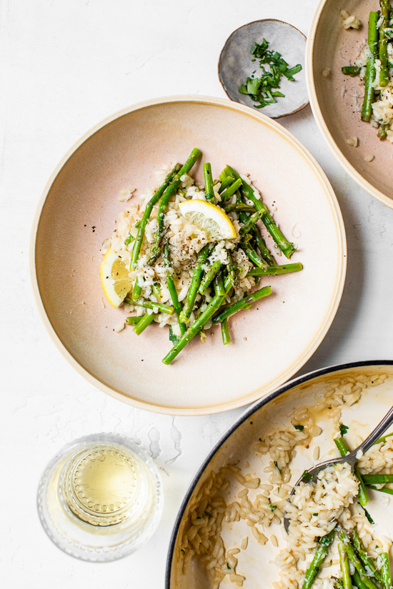 Creamy asparagus risotto, cooked with fresh herbs, Parmigiano-Reggiano and a touch of lemon. Perfect Spring meatless main dish or wonderful topped with grilled shrimp or scallops.