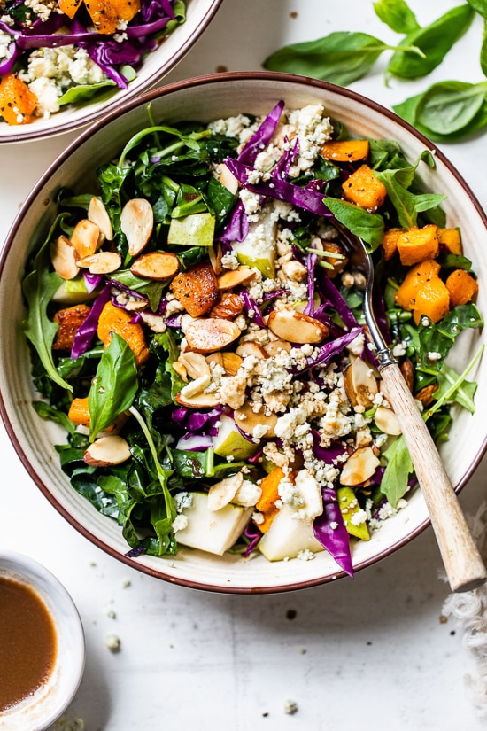 Immune-boosting kale, squash, purple cabbage, arugula, almonds, basil and pears are all tossed in a tangy-sweet dressing. To add more protein, you could add grilled shrimp or salmon.