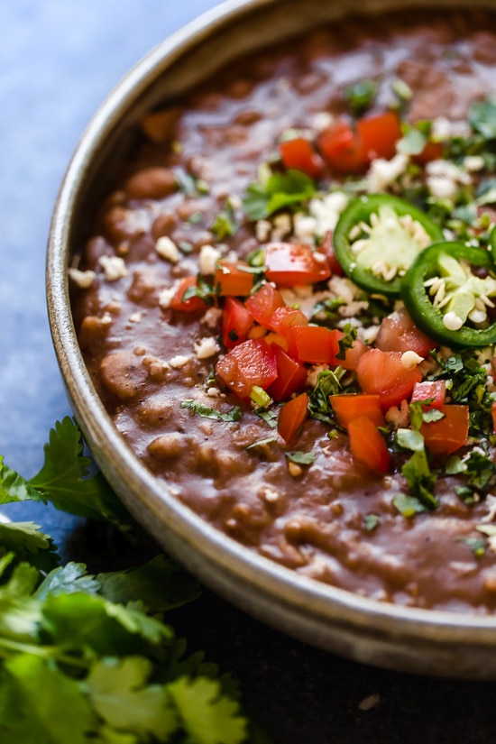 If you love the flavor of refried beans but would rather avoid the lard they are typically cooked in, you’ll love this easy, fat-free version made in the Instant Pot.