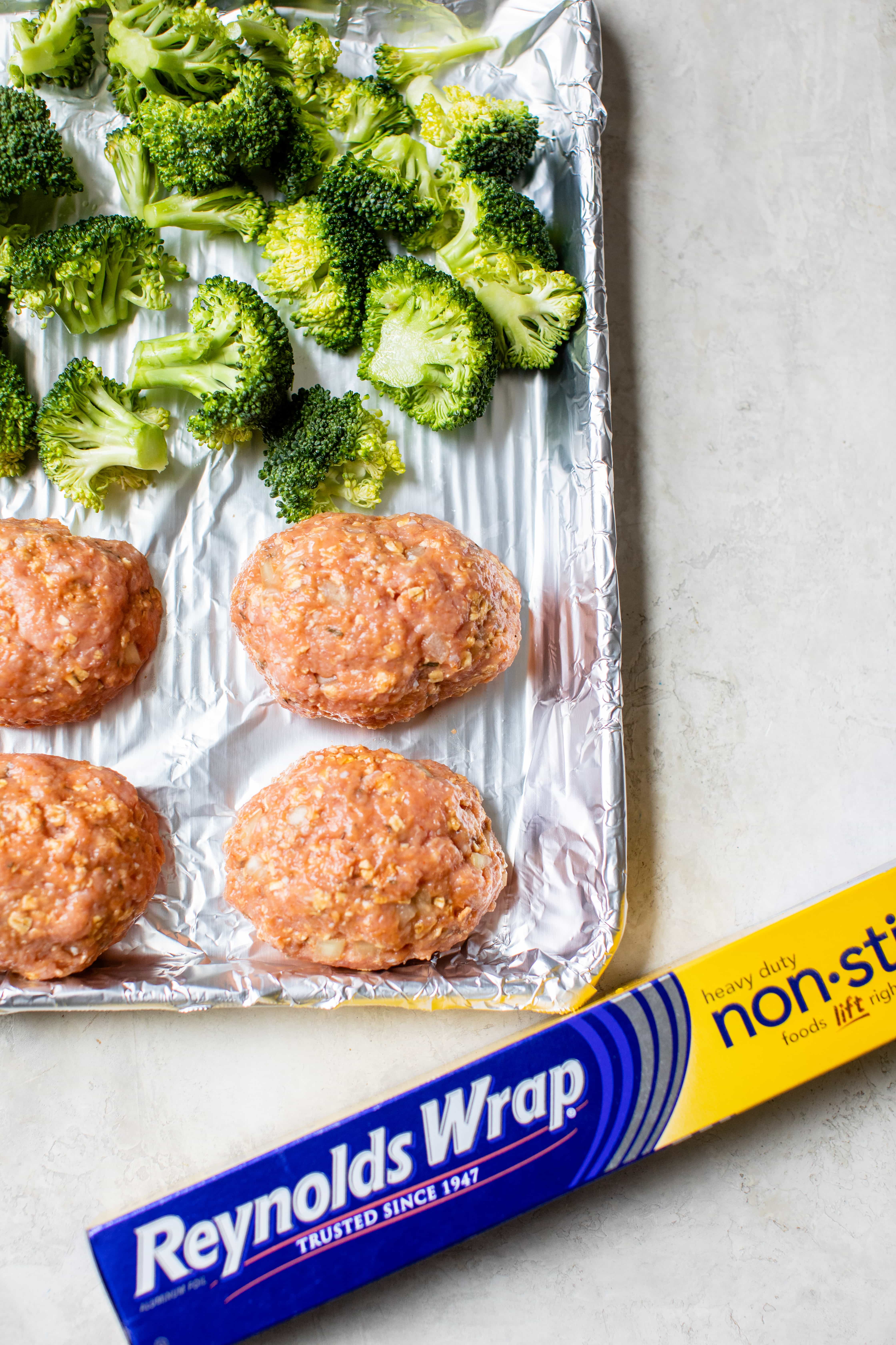 Sheet Pan Turkey Meatloaf and Broccoli made with individual loaves cooked on a foil-lined sheet pan for a quick meal with easy cleanup.