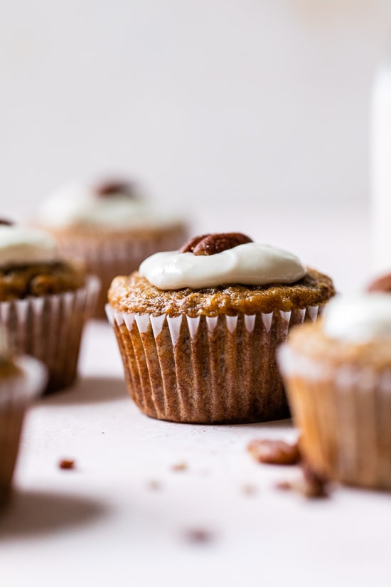 These super moist hummingbird cupcakes are light, full of pineapple, chopped bananas, pecans, cinnamon and spices topped off with a sweet cream cheese frosting.