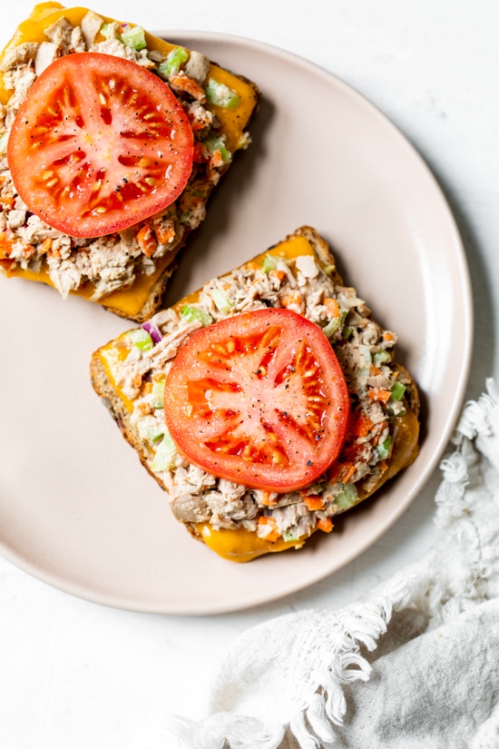 Open Faced Tuna Melt is the ultimate sandwich for all you tuna lovers! Serving them open faced is an easy way to make them healthier and cut the calories.