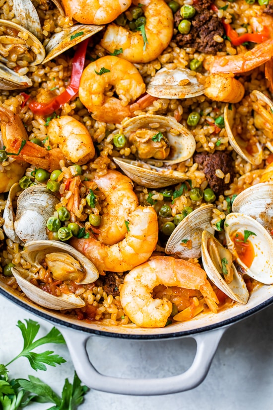 This easy seafood paella, made with shrimp, clams and chorizo is a delicious one-pot dish!