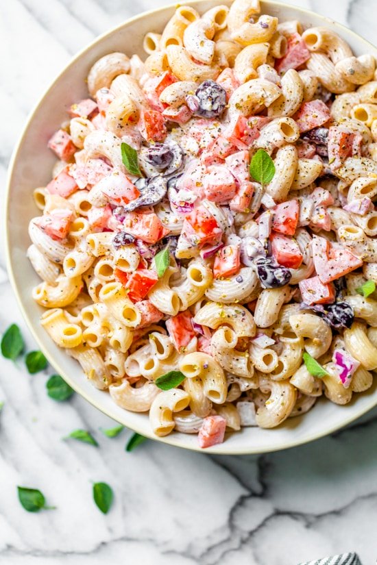 This lighter version of Macaroni Salad with tomatoes and black olives is the perfect side dish for any summer BBQ.