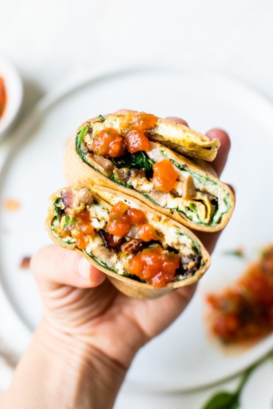 This Omelet Tortilla Breakfast Wrap takes a classic omelet and cooks it with a tortilla right in the skillet. Then simply roll it up and you have an easy on-the-go breakfast.