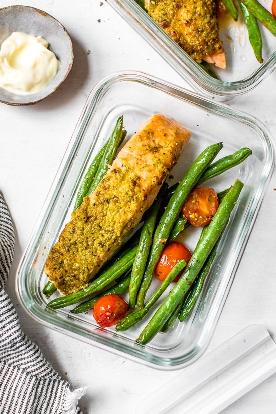 salmon and green beans in a meal prep container